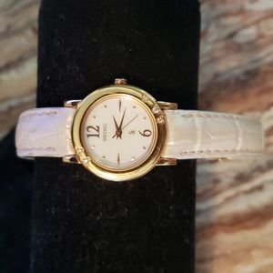 Seiko Lukia Stainless Steel Watch with Pink Leather Band and 5 tiny diamonds